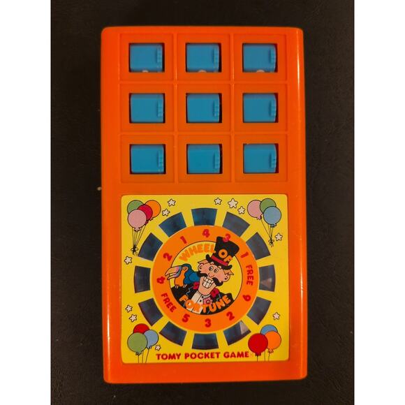 TOMY Pocket Game - Wheel Of fortune - Picture 1 of 3